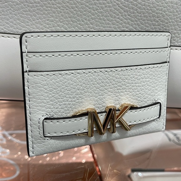 MICHAEL KORS
Reed Large Pebbled Leather Card Holder Case
Optic White 
NWT - Picture 5 of 16
